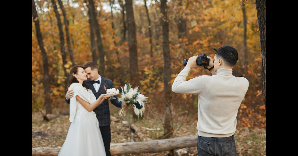 A professional photographer capturing a couple wedding photography 